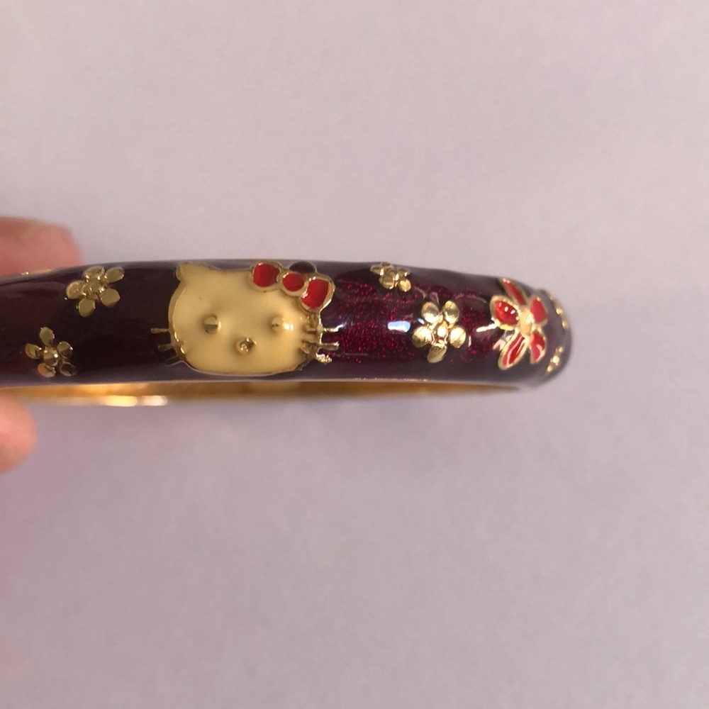 Hello kitty jiu long zing purple enamel clap bracelet
